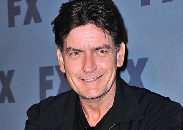 Charlie Sheen admits he was 'hurting himself' with his wild behaviour