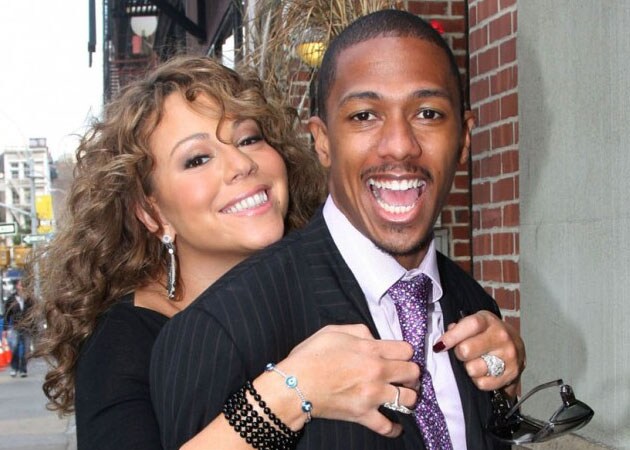 Mariah Carey and Nick Cannon bid $21,000 at charity event