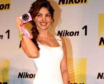 'Lovely in white,' Mrs Beckham to Priyanka Chopra