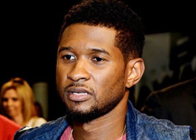 Usher is 'standing strong' after death of stepson Kyle 