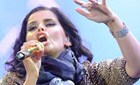 nelly furtado piles on the pounds