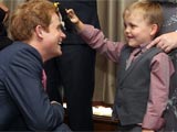 Suit-clad Prince Harry makes first appearance after nude photos princeharry-children-firstappearance.jpg