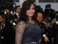 Gutsy Ash wears clingy Elie Saab and a smile