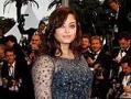 Gutsy Ash wears clingy Elie Saab and a smile