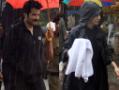 A walk in the rain: Anil and Sunita Kapoor