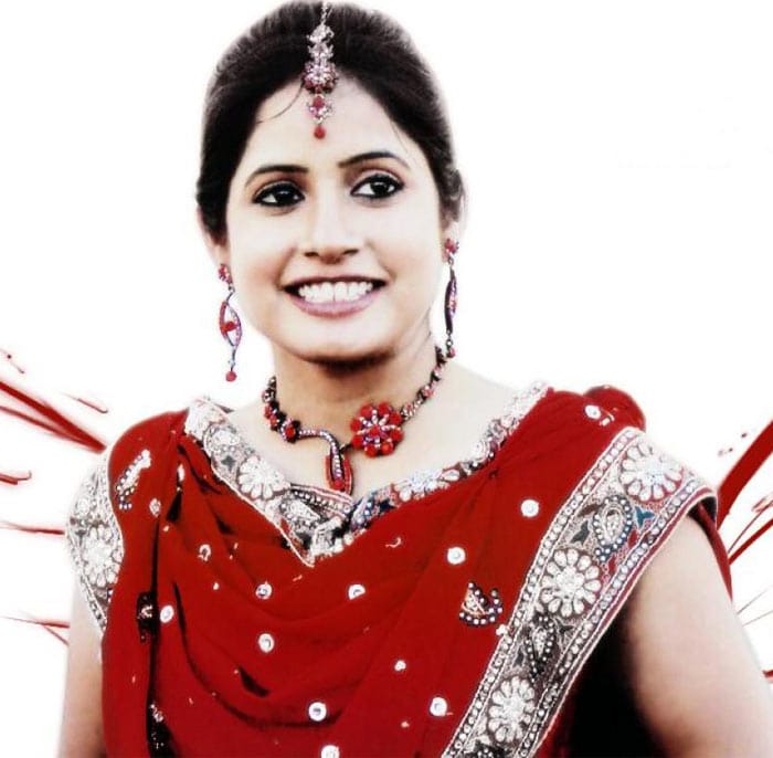 the world is not enough actress name. her stage name Miss Pooja.