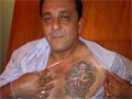 Sanjay Dutt flashes tattoo tribute to parents