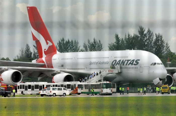 Qantas plane lands in Singapore after mid-air emergency