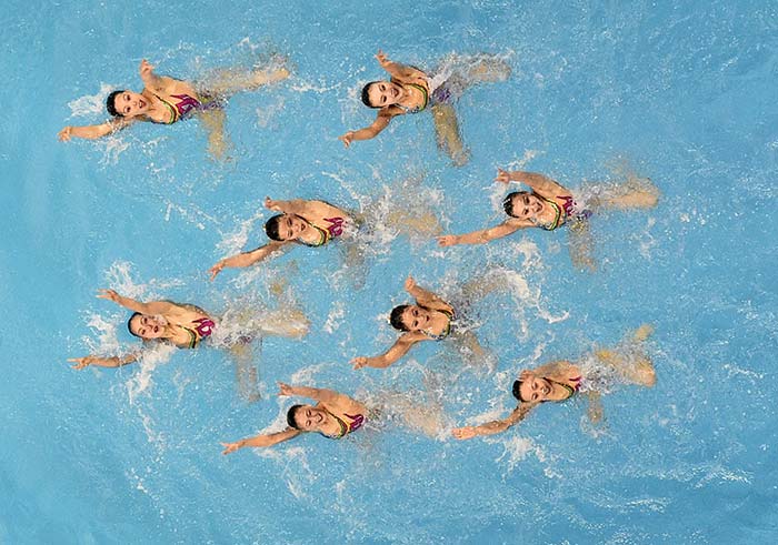North Korea's swimmers compete in the team technical routine synchronised swimming event.