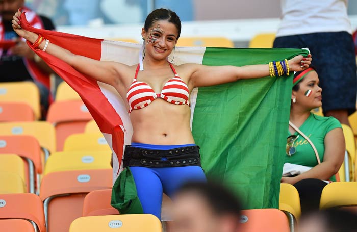 Football action has set temperatures soaring all over the world. The 'sizzle' is at its peak in Brazil - the host nation of the FIFA World Cup 2014. <br<br>Here's a look at how fans are doing their bit to increase the football-fever! (All images courtesy AFP)
