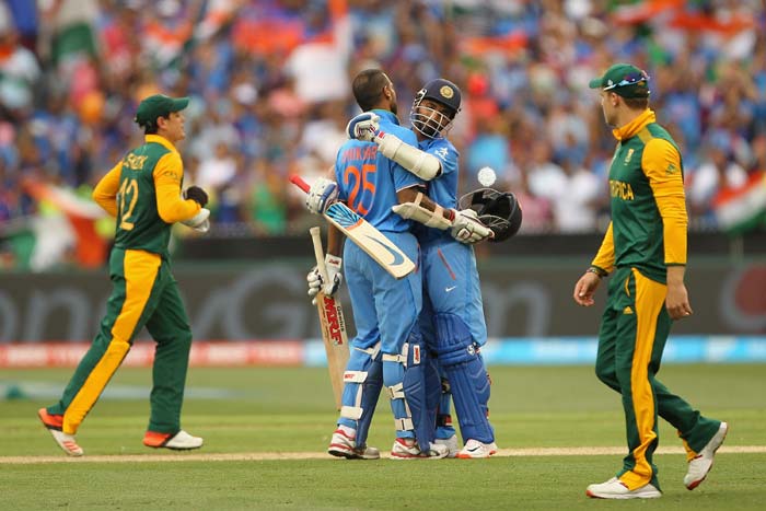 Rahane, who slammned 79, congratulates Rahane, who notched up his seventh ODI ton and the first in a World Cup.