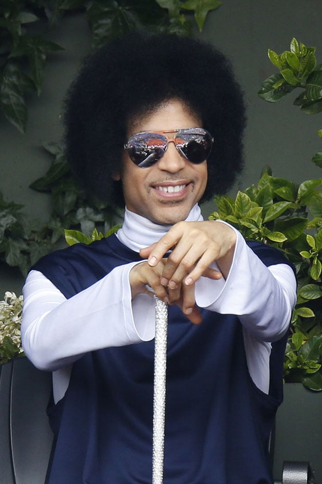 Prince and his bedazzled cane steal the show at NBA game