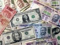 डॉलर के मुकाबले रुपया रिकॉर्ड निचले स्तर पर, 61.80 तक पहुंचा