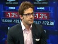 Wall St down 1% over Greece; US business confidence at year-high