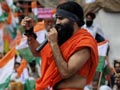 Video : 'Apolitical' Ramdev targets Congress