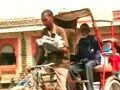 Video : This rickshaw puller has a child strapped to his chest