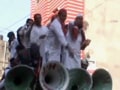 Video : Akhilesh's party workers throw money in the air to celebrate