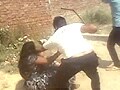Videos : पंजाब : महिला की सरेआम डंडों से पिटाई