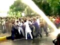 Video : Cops use water cannons on protesters outside Railways Minister's house