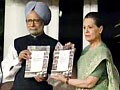 Manmohan Singh releases UPA-II's report card