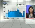 Sensex ends flat after briefly hitting 18K
