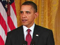 Video : Stop attacks on civilians or face military action, Obama warns Gaddafi