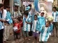 Kolkatans draped in blue and white
