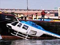Video : 'A helicopter's down! Someone call 911!'