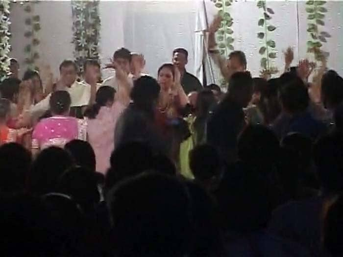 Ambani brothers with their families, relatives dance to the tunes of dandiya at the family get together in Chorwad in Gujarat.