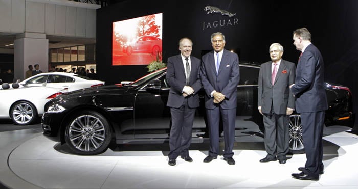 Tata Motors Chairman Ratan Tata, second left, Managing Director Ravi Kant, third left, and other officials pose at the launch of the Jaguar XJ at the 10th Auto Expo. (AP image)