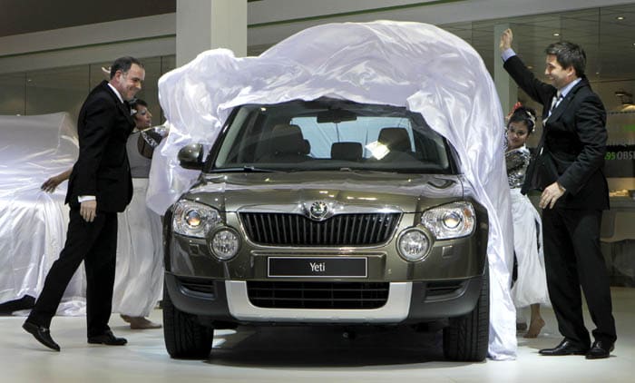Skoda Auto Member of the Board Reinhard Fleger, left, and Skoda Auto India Member of the Board Thomas Kuehl unveil the newly launched SUV Yeti at the 10th Auto Expo. (AP image)