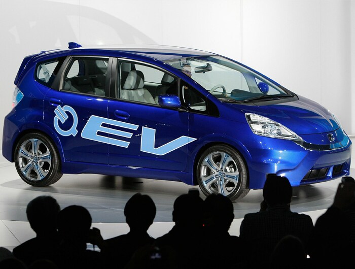 During the show it was evident that EVs and other green vehicles may finally be ready for prime time. In their global debuts, Honda showed off the concept for its Fit EV as well as the platform for a plug-in hybrid.  Honda Fit EV, is a five-seater plug-in vehicle that can run up to 100 miles in a single charge, at up to 90 mph. The Fit EV is designed to meet the daily driving needs of the average metropolitan commuter and utilizes the same 5-passenger layout found in the popular Fit hatchback. When the Fit EV production model is introduced, it will be powered by a lithium-ion battery and coaxial electric motor. (Photo: AFP)