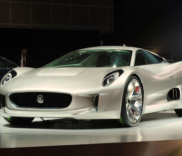 Luxury car manufacturer Jaguar, owned by Tata Motors, unveiled their concept electric car, the Cx75 at the Los Angeles Auto Show. On a single full charge, the Cx75 can run for 900 kms and has a top speed of 320 kmph. According to company, four 145kW motors help the car to accelerate from 0-100 kmph in under 3.1 seconds. (Photo: AFP)