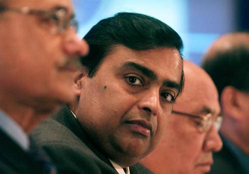 Mukesh D. Ambani is the chairman and managing director of Reliance Industries Ltd. He has topped the Forbes list of richest Indians. <b>Net worth estimated at $32 billion.</b> He is a chemical engineer from University Institute of Chemical Technology (earlier University Department of Chemical Technology), University of Mumbai (earlier University of Bombay). He has pursued MBA from Stanford University, USA.
The Reliance Group, founded by Dhirubhai H. Ambani (1932-2002), is India's largest private sector enterprise, with businesses in the energy and materials value chain. (PTI photo)