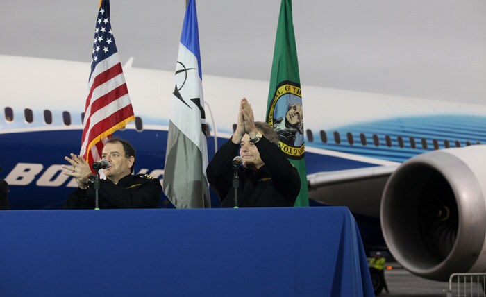 Chief 787 pilot Make Carriker, right, and Captain Randy Neville, left, talk to reporters after the inaugural flight of the first production Boeing 787 at Boeing Field in Seattle, on Tuesday. "The airplane responded just as we expected," Randy Neville, one of the two pilots, said after touchdown on Tuesday at Seattle's Boeing Field. "It was a joy to fly." (AP photo)