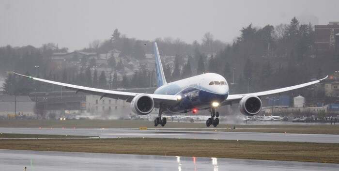 A Boeing Co. 787 airplane comes in for a landing at Boeing Field in Seattle after making its inaugural test flight Tuesday, Dec. 15, 2009. For the first time, Boeing has relied on suppliers around the globe to build nearly all components of the plane, which are then assembled in Everett.