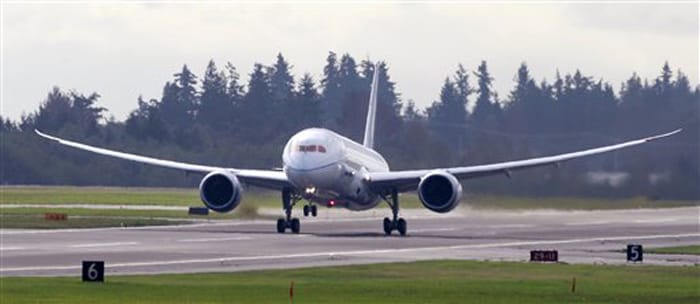 The Boeing 787 test plane takes off on its first flight. The plane is the final in the test plane group and the second using General Electric engines. (AP Photo)