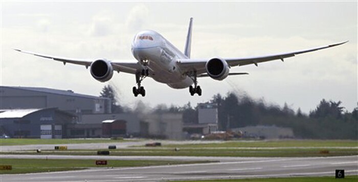 The Boeing 787 test plane takes off on its first flight on October 4, 2010. The plan was piloted by Capt. Christine K. Walsh and first officer Bill Roberson. (AP Photo)