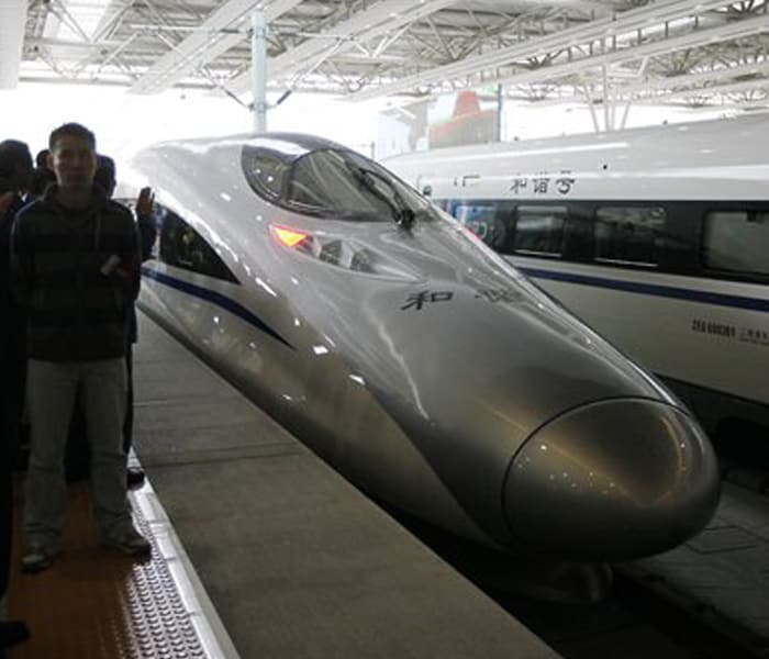 Journalists photograph the bullet trains of a new high-speed railway linking Shanghai, China's economic hub, and Hangzhou, capital of east China's Zhejiang Province. Trains on the line will travel at an average speed of 350 kilometers per hour, shortening the trip between to 45 minutes from 78 minutes. The country is rapidly expanding and upgrading its railway network amid increased pressures on its transportation system. (Photo: AP)