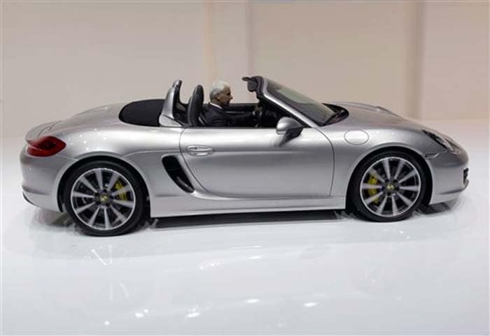 Porsche CEO Matthias Mueller takes the wheels of the new Boxster during a preview at Geneva International Motor Show. The Boxster has now reached almost classic status, from its former almost cult-like following, and continues to be a favourite among the rich and famous who also wanted to be fast and furious.