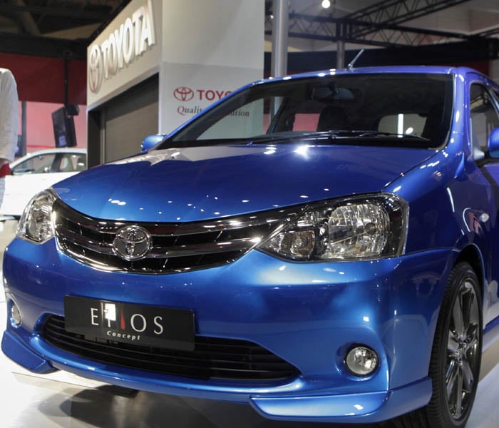 TKM sells models such as sedans Toyota Corolla Altis and Camry along with multi utility vehicle Innova. TKM Managing Director Hiroshi Nakagawa said about 70 per cent of the components of Etios are locally sourced. Only critical components like engines and transmissions are imported. (Photo: AP)