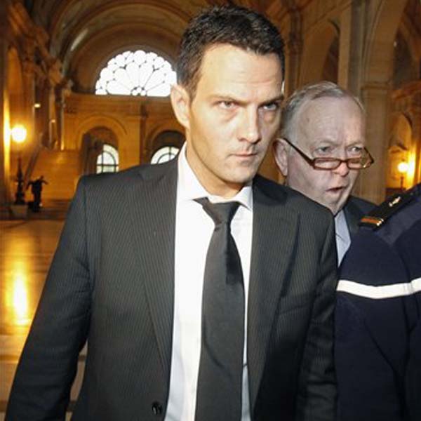 Jerome Kerviel, left, followed by his lawyer Olivier Metzner, right, arrives at the Paris courthouse. Kerviel, the 33-year-old former index futures trader at Societe Generale SA, risks five years in prison and a euro 375,000 ($513,000) fine on charges related to the claim that he covered up bets worth nearly euro 50 billion, or more than the bank was worth, between late 2007 and early 2008. By ordering a tough sentence for a lone trader, the ruling marked a startling departure from the general atmosphere of hostility and suspicion about big banks in an era of financial turmoil. (AP Photo)