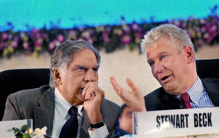 Heaping praises on Gujarat Chief Minister Narendra Modi's leadership for not only driving industrial growth but also boosting rural development, Tata Group chairman Ratan Tata said his Group will partner the state in providing transportation into the hinterlands. "The leadership of Narendra Modi has proved that Gujarat is not only seeing industrial growth but is also witnessing rural development," Tata said at the 5th Global Summit of Vibrant Gujarat in Gandhinagar. <br><br>The Tata group has signed an MoU with the Gujarat government to provide rural transportation, he added. This will be in addition to the ongoing rural initiatives such as skills development activities, sanitation and water projects where the group is already a partner. "Today the group has a total investment in the excess of Rs 30,000 crore (in Gujarat) and employs 50,000 people directly and several more indirectly. I am here to say that the investments will continue as we move forward," Tata said.