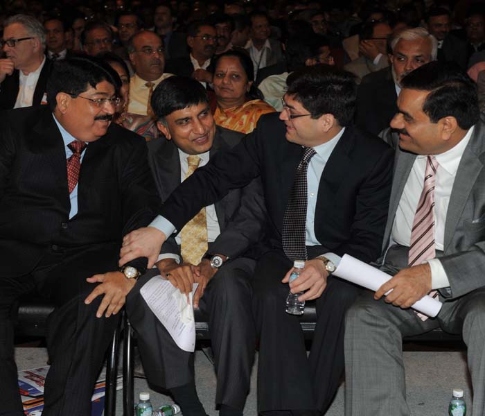 Investors in a jovial mood during the summit. (Photo: AFP)