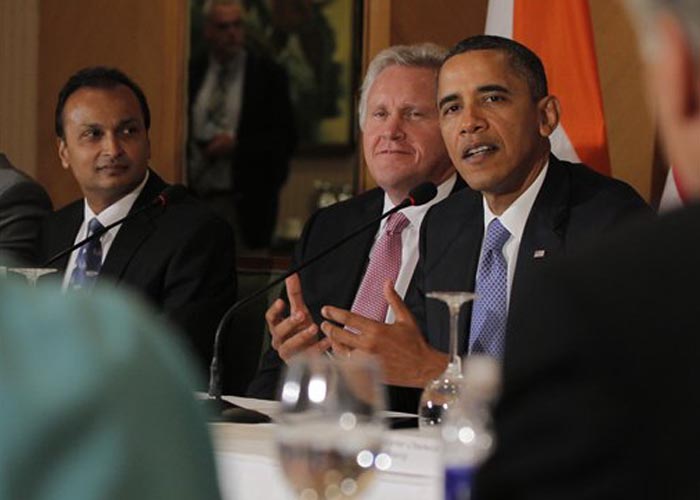 In line with his agenda to create more jobs for the Americans, US President Barack Obama on the first day of his India visit on November 6 announced 20 new bilateral trade deals. Business leaders accompanying US President Barack Obama on his visit  feel India has the potential to become America's largest trading partner. <br></br> In this picture, Barack Obama, seated with General Electric's Jeffrey Immelt, center, and Anil Ambani of Reliance Anil Dhirubhai Ambani, left, holds a roundtable discussion with CEO's and business leaders organised by the US-India Business Council (USIBC) in Mumbai on November 6, 2010. (PTI Photo)