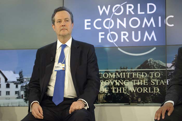 Standard and Poor's President Douglas Peterson attends a session at the World Economic Forum 2012 in Davos.