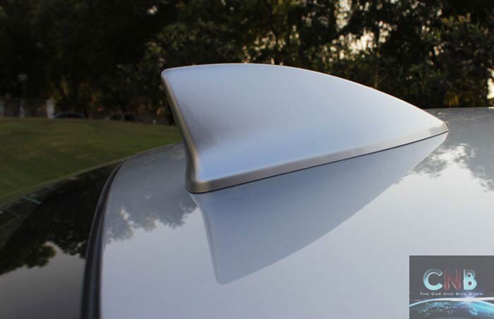 A shark fin roof antenna replaces the traditional aerial, giving the car a high-end look.