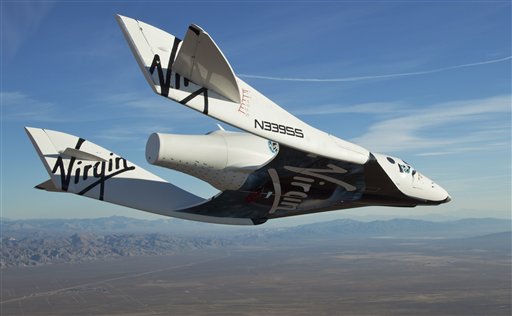 Virgin Galactic SpaceShipTwo, or VSS Enterprise, glides toward the earth on its first test flight after release from the mothership, WhiteKnight2.(AP)