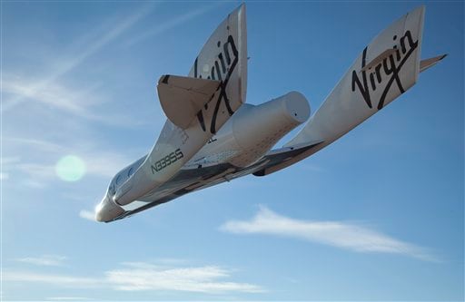 SpaceShipTwo is undergoing testing before it can carry tourists to space. In the latest test, SpaceShipTwo did not fire its rocket engine to climb to space. (AP)
