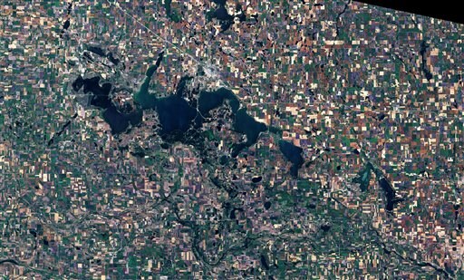 Since the water began rising in the early 1990s, more than 400 homes around the lake have been relocated or destroyed. (AP)